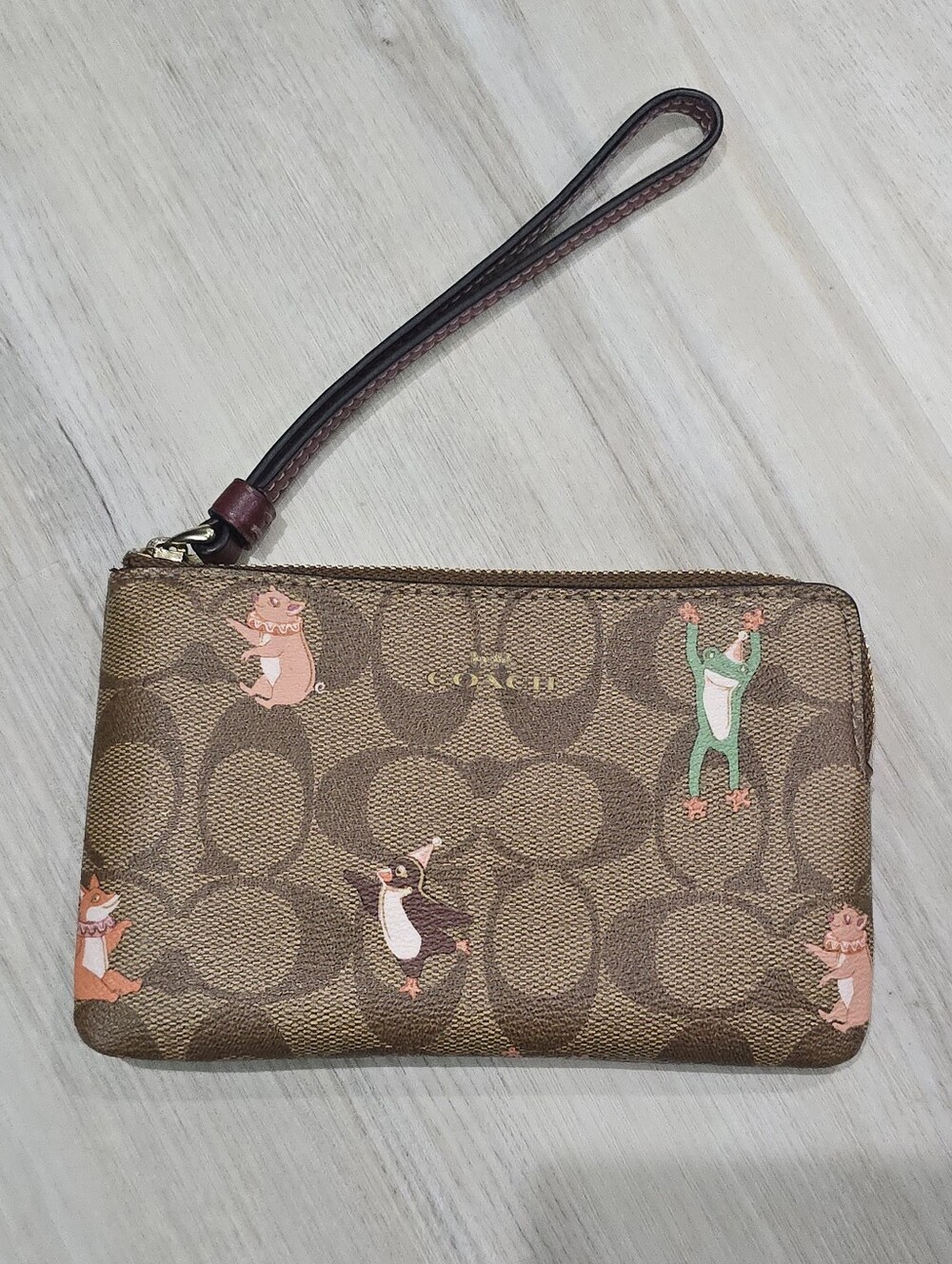 Coach Brown Signature Wristlet with Limited Edition Party Animal Print